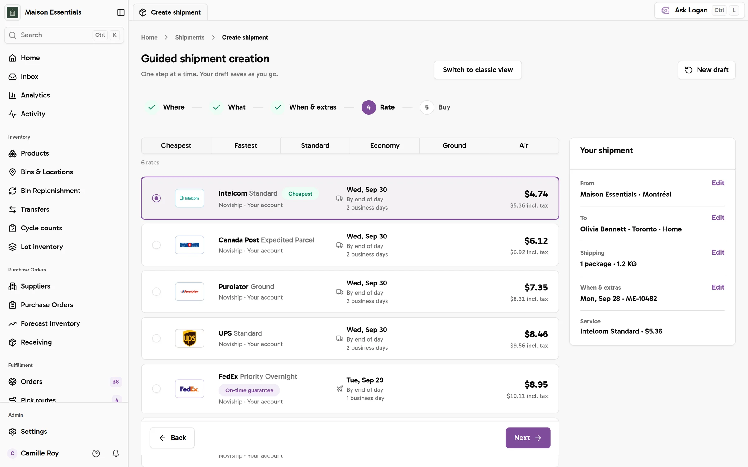Guided shipment creation on the rate step, with six carrier quotes from $4.74 and the cheapest one selected